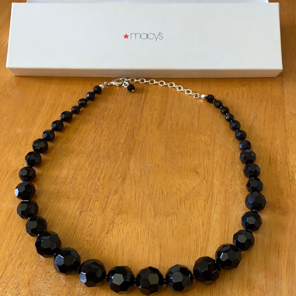 Costume jewelry.  Black faceted beads.